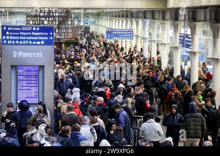 London, UK. 31st Dec, 2023. Stranded passengers are pictured at St Pancras International Station in London, Britain on Dec. 30, 2023. Eurostar trains to and from London have been cancelled on Saturday after a tunnel under River Thames was flooded, stranding thousands of passengers ahead of New Year's Eve. Credit: Xinhua/Alamy Live News Stock Photo