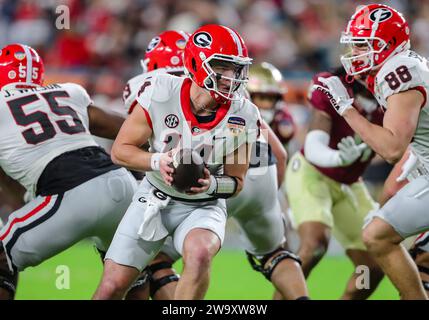 Georgia quarterback Gunner Stockton (14) runs from Notre Dame ...