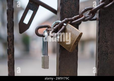Singapore - September 4 2023: Eye Brand Lock with Gate Chains Stock Photo