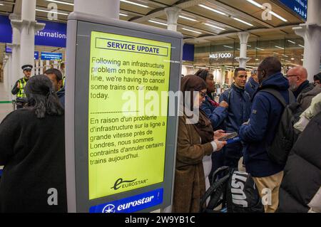 London, UK. 30th Dec, 2023. All Eurostar trains from St Pancras have been cancelled due to an Infrastructure problem. There was some flooding in the Channel tunnel. Many people have been left stranded. Some are in tears.There are no more trains today to Paris, Brussels or Amsterdam causing travel chaos for many people. Some famililies may not get home for New year. Credit: Mark Thomas/Alamy Live News Stock Photo