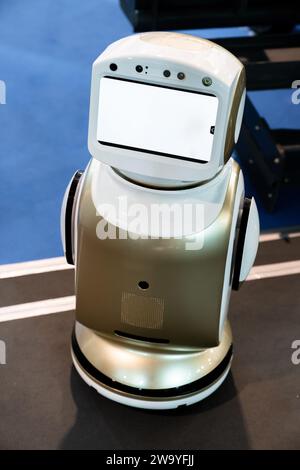 Robot consultant with blank screen.. Stock Photo