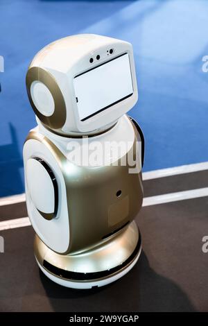 Robot consultant with blank screen.. Stock Photo