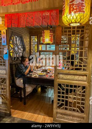 Beijing, China, Crowd People inside Tables, Contemporary Interiors, Modern , Shopping Malls, Beijing APM, Traditional Chinese Restaurant, Stock Photo