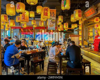 Bejiing, China, Crowd People inside Tables, Contemporary Interiors, Modern , Shopping Malls, Beijing APM, Traditional Chinese Restaurant, Stock Photo