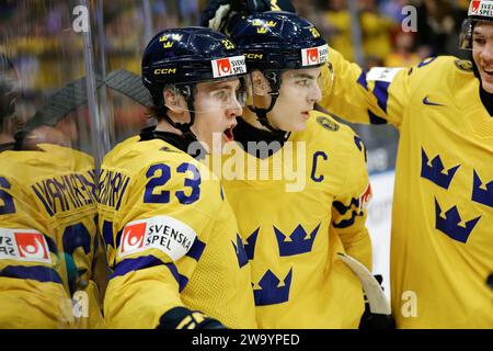 Gothenburg, SWEDEN 20231231Sweden's Jonathan Lekkerimaki scores 2-2 during the IIHF World Junior Championship group A ice hockey match between Sweden Stock Photo