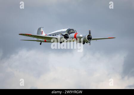 1946 Avro C.19 Anson ‘G-AHKX’ airborne at Shuttleworth Race Day Airshow on the 1st October 2023. Stock Photo