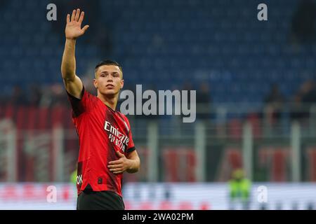 Jan-Carlo Simic of AC Milan greets the fans during the Serie A 2023/24 football match between AC Milan and US Sassuolo at San Siro Stadium. Final score; AC Milan 1: 0 US Sassuolo. (Photo by Fabrizio Carabelli / SOPA Images/Sipa USA) Stock Photo