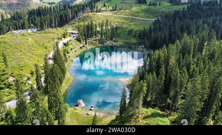 drone photo Carezza lake, Karersee, Lago di Carezza dolomites italy europe Stock Photo