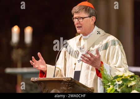 Cologne, Germany. 31st Dec, 2023. Cardinal Rainer Maria Woelki, Archbishop of Cologne, celebrates the end-of-year pontifical mass in Cologne Cathedral. Credit: Thomas Banneyer/dpa/Alamy Live News Stock Photo