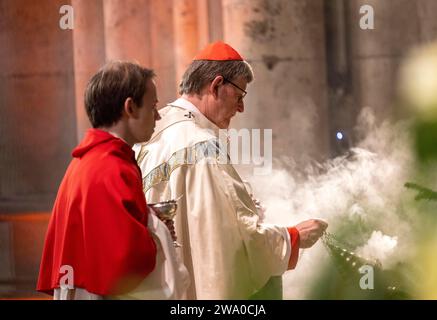 Cologne, Germany. 31st Dec, 2023. Cardinal Rainer Maria Woelki, Archbishop of Cologne, celebrates the end-of-year pontifical mass in Cologne Cathedral. Credit: Thomas Banneyer/dpa/Alamy Live News Stock Photo