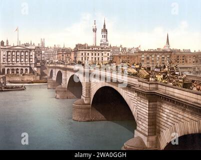 Vintage color photolithograph of people and horse-drawn carriages on London Bridge in London, England ca. 1890-1900 Stock Photo