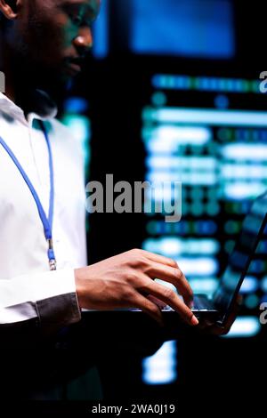Technician checking event logs and diagnostic tools to find damaged ...