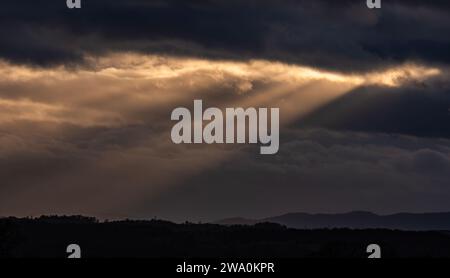 Winter sunset over the Malvern Hills and Worcestershire as night falls at the end of 2023. Stock Photo
