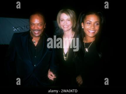 Burbank, California, USA 17th October 1996 (L-R) Producer Quincy Jones, Actress Peggy Lipton and daughter Kidada Jones attend Sixth Annual Fire & Ice Ball to Benefit Revlon/UCLA WomenÕs Cancer Research on October 17, 1996 at Warner Bros. Studios in Burbank, California, USA. Photo by Barry King/Alamy Stock Phot Stock Photo