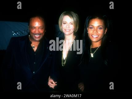 Burbank, California, USA 17th October 1996 (L-R) Producer Quincy Jones, Actress Peggy Lipton and daughter Kidada Jones attend Sixth Annual Fire & Ice Ball to Benefit Revlon/UCLA WomenÕs Cancer Research on October 17, 1996 at Warner Bros. Studios in Burbank, California, USA. Photo by Barry King/Alamy Stock Phot Stock Photo