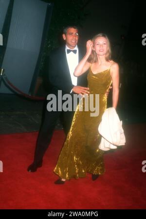 Burbank, California, USA 17th October 1996 Actor George Clooney and Celine Balitran attend Sixth Annual Fire & Ice Ball to Benefit Revlon/UCLA WomenÕs Cancer Research on October 17, 1996 at Warner Bros. Studios in Burbank, California, USA. Photo by Barry King/Alamy Stock Photo Stock Photo