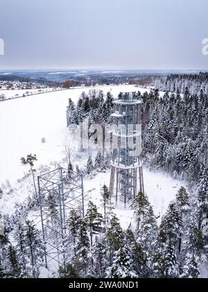 Observation tower rises out of a snowy landscape surrounded by trees, aerial view, Schömberg, Black Forest, Germany, Europe Stock Photo