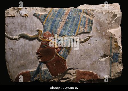 Luxor, Egypt - January 2, 2024: Ancient colorful relief of a pharaoh in Luxor Museum Stock Photo