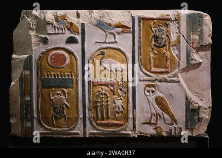 Luxor, Egypt - January 2, 2024: Ancient colorful relief and artifact with hieroglyphics in Luxor Museum Stock Photo