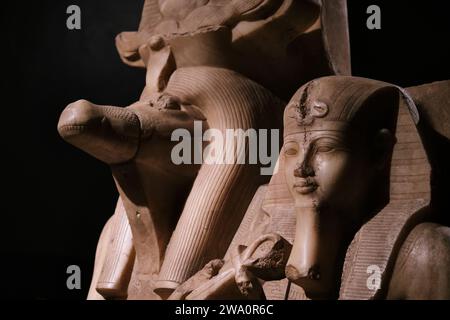 Luxor, Egypt - January 2, 2024: The crocodile headed deity Sobek and Amenhotep III in Luxor Museum Stock Photo