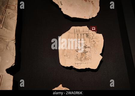Luxor, Egypt - December 26 2023: Ancient Egyptian architectural plan drawings on a stone in Luxor Museum Stock Photo