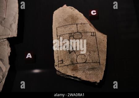 Luxor, Egypt - December 26 2023: Ancient Egyptian architectural plan drawings on a stone in Luxor Museum Stock Photo