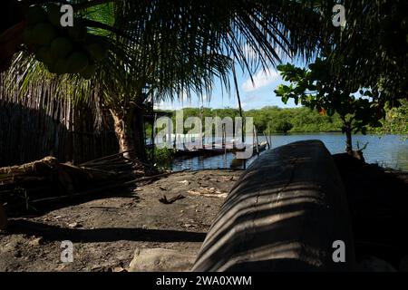 Aratuipe, Bahia, Brazil - May 30, 2015: View of the Jaguaripe River through the trees in Maragogipinho district of Aratuipe in Bahia. Stock Photo