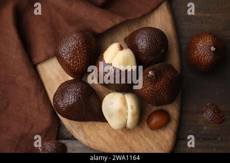 Fresh salak fruits on wooden table, top view Stock Photo
