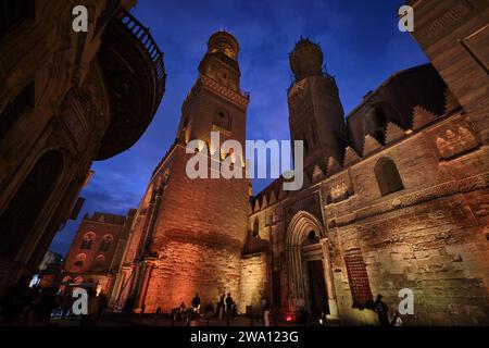 Cairo, Egypt - December 24 2023: The Qalawun complex is a massive pious complex in Al-Muizz Street,  Old Cairo Stock Photo