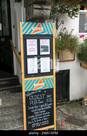 Autumn 2023, Fowey in Cornwall England and the Ship Inn public house with information sign on being oldest pub, England,UK Stock Photo