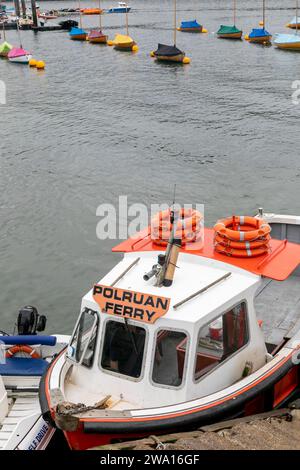 Autumn 2023, Fowey in Cornwall England small ferry boat that goes across the harbour to the village of Polruan, England,UK Stock Photo