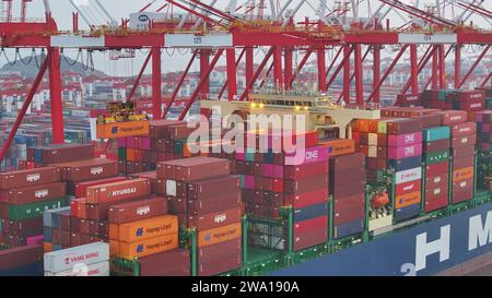 SHANGHAI CHINA JANUARY 1 2024 An Ultra Large Cargo Ship Carries   Shanghai China January 1 2024 An Ultra Large Cargo Ship Carries Out Container Handling Operations At The Automated Terminal Of Yangshan Deep Wat 2wa190a 