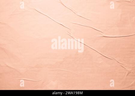 Glued peach color paper poster texture background Stock Photo
