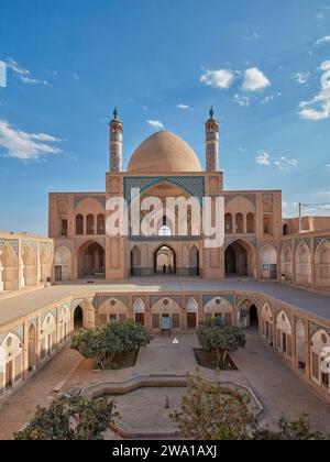 View of the 18th century Agha Bozorg Mosque and its sunken courtyard. Kashan, Iran. Stock Photo