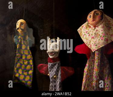 Three 19th century Persian glove puppets displayed in the Puppet Museum House in Kashan, Iran. Stock Photo