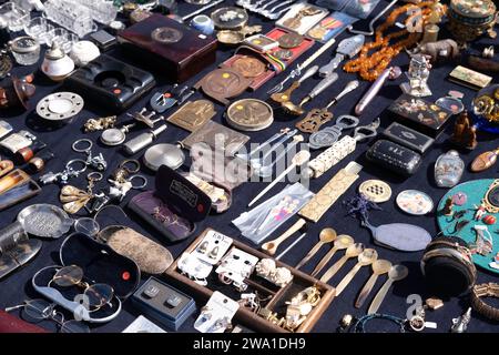 Collection of objects, utensils and items of modest value displayed and for sale at an outdoor flea market in Maastricht Stock Photo