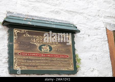 Smugglers Cott seafood and steak restaurant in Looe Cornwall, built in 1420 from timbers from the Armada, England,UK,2023 Stock Photo