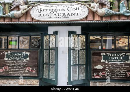 Smugglers Cott seafood and steak restaurant in Looe Cornwall, built in 1420 from timbers from the Armada, England,UK,2023 Stock Photo