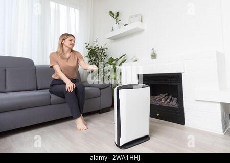 Dehumidifier with touch panel, humidity indicator, uv lamp, air ionizer. Air dryer Stock Photo