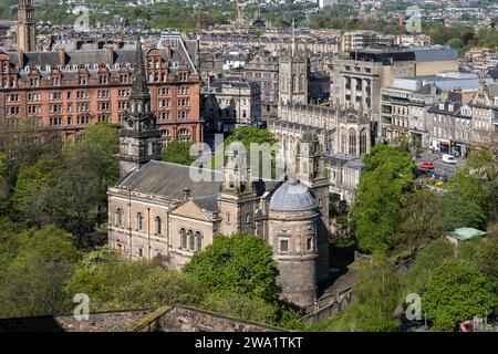 City of Edinburgh in Scotland, elevated view of Parish Church of St Cuthbert and St. John's Scottish Episcopal Church in the city centre. Stock Photo