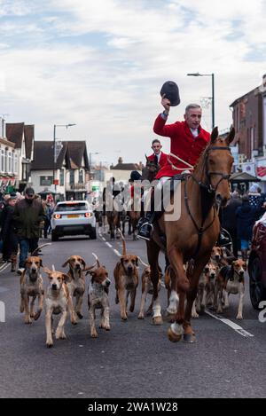 High Street, Maldon, Essex, UK. 1st Jan, 2024. The Puckeridge and Essex Union Hunt (formed by amalgamation of The Essex with Farmers & Union Hunt and the Puckeridge Hunt) paraded their horses and hounds along Maldon High Street for their annual New Year’s Day meeting. Hunt supporters, members of the public and Action Against Foxhunting anti-hunt protesters attended the event Stock Photo