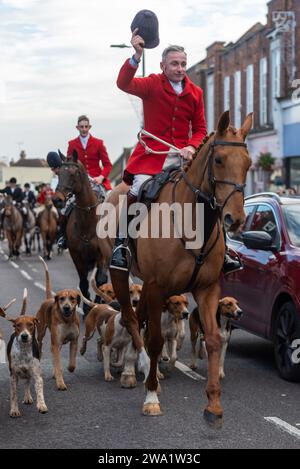 High Street, Maldon, Essex, UK. 1st Jan, 2024. The Puckeridge and Essex Union Hunt (formed by amalgamation of The Essex with Farmers & Union Hunt and the Puckeridge Hunt) paraded their horses and hounds along Maldon High Street for their annual New Year’s Day meeting. Hunt supporters, members of the public and Action Against Foxhunting anti-hunt protesters attended the event Stock Photo