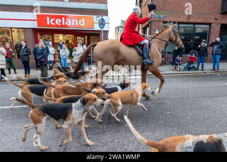 High Street, Maldon, Essex, UK. 1st Jan, 2024. The Puckeridge and Essex Union Hunt (formed by amalgamation of The Essex with Farmers & Union Hunt and the Puckeridge Hunt) paraded their horses and hounds along Maldon High Street for their annual New Year’s Day meeting. Hunt supporters, members of the public and Action Against Foxhunting anti-hunt protesters attended the event Stock Photo