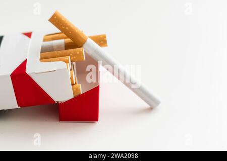 Heap of cigarettes. Isolated on a white background. Stock Photo