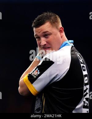 Chris Dobey in action against Rob Cross during night six of the BetMGM Premier League at