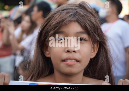 Minalin, Philippines. 1st January 2024. Real men crossdresses on New Year’s Day as part of the annual ‘Aguman Sanduk Festival’ in Minalin, Pampanga. The festival traces it’s roots in 1932 when the town of Minalin experienced severe drought, no harvest  and most of families are left hungry on New Year’s Day and to cheer-up the spirit of the town’s people, some men crossdresses and parade themselves on the street to cheer up everyone. (Credit Image: © Sherbien Dacalanio/Alamy Live News) Stock Photo