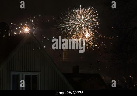 Motala, Sweden. 1st, January, 2024. Fireworks in a residential area during New Year's Eve, Motala, Sweden. Credit: Jeppe Gustafsson/Alamy Live News Stock Photo