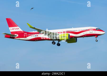 Amsterdam, Netherland - April 28th 2022: Latvija A220 at Amsterdam Airport Stock Photo