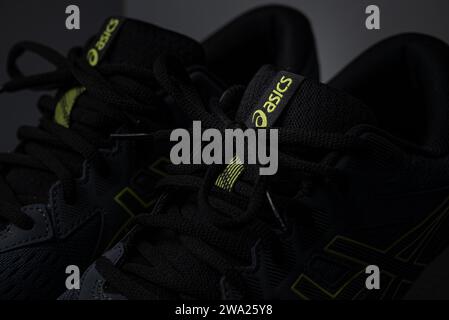 Antalya, Turkey - November 28, 2023: Close-up of the logo on Asics running shoes Stock Photo