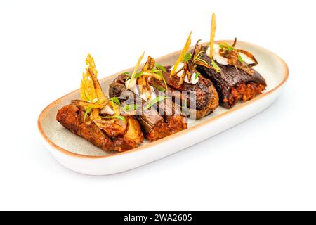 Stuffed dried eggplant, traditional Turkish dish, on a white background Stock Photo